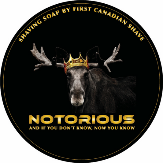 Moose wearing a crown with text about shaving soap on a black background
