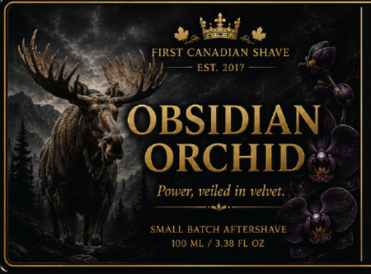 A rectangular product label for First Canadian Shave Obsidian Orchid aftershave. The design features a dark moody background with a large black-brown moose on the left, dark purple orchid flowers on the right, and gold text and borders.