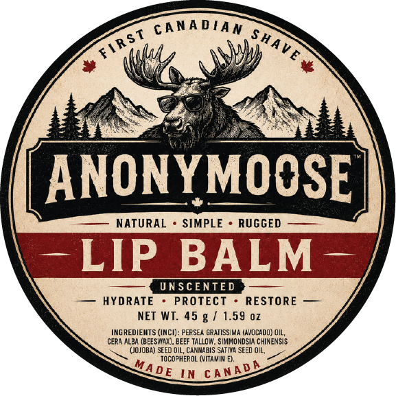 Round product label for Anonymoose Lip Balm, featuring a vintage-style design with a moose head, mountains, trees, and the text 'First Canadian Shave,' 'Natural Simple Rugged,' and 'Lip Balm.'.